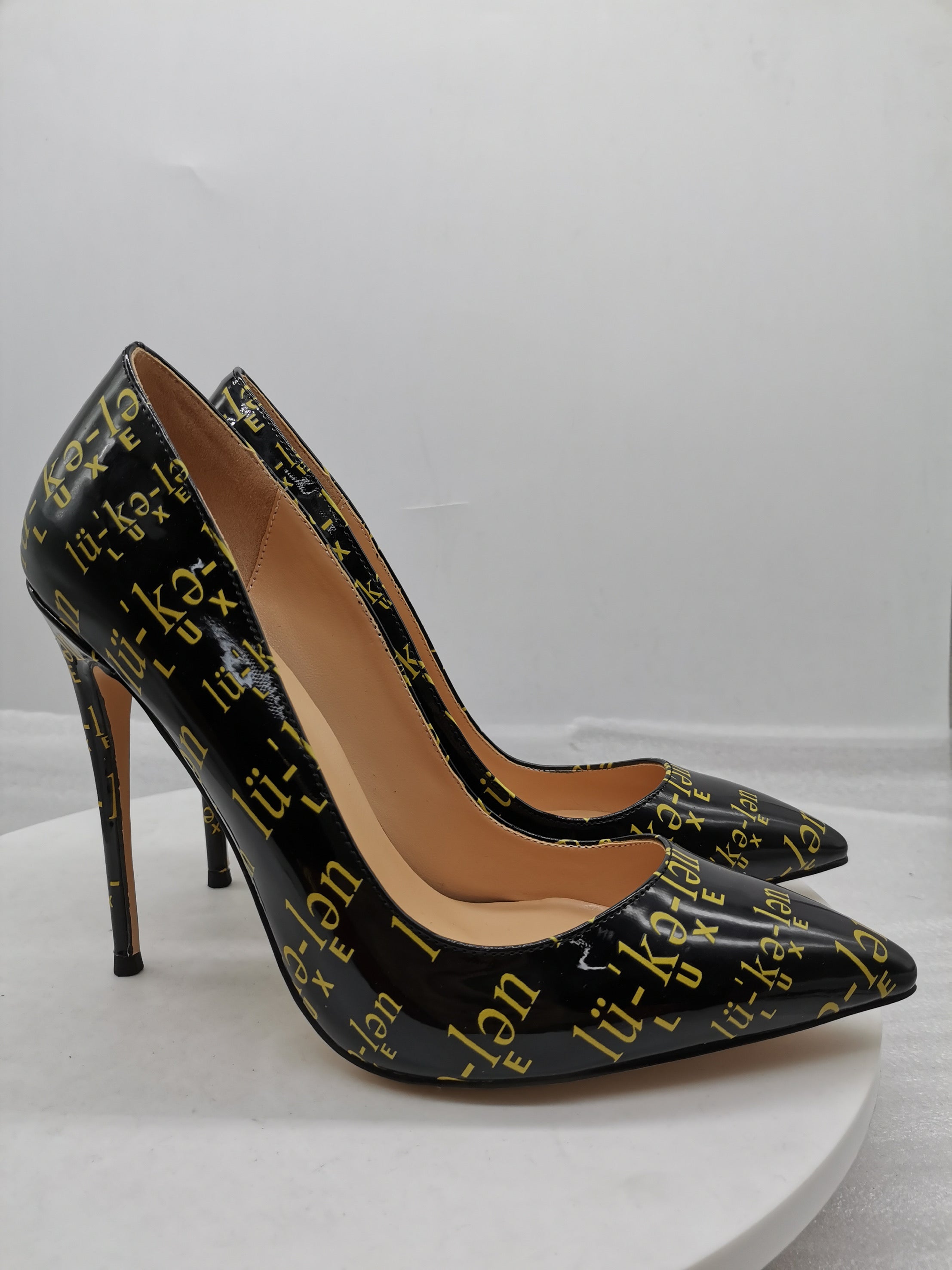 louis vuitton black and gold heels